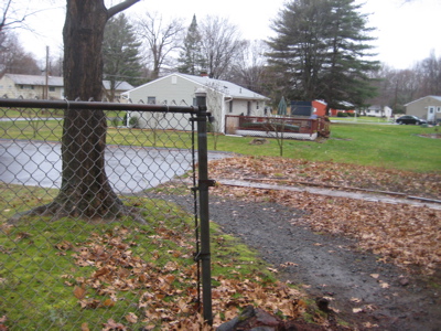 This is the ugly end of the CT Nevins Avenue, with border fence in foreground