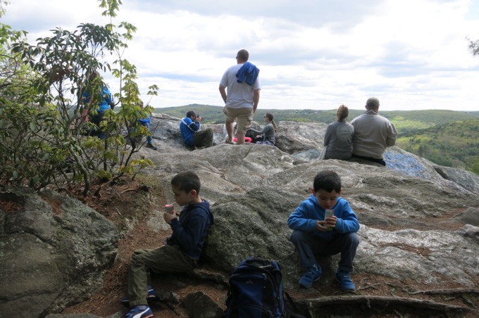 This picture makes me happy.  It reminds me of all the summit pictures over my years of hiking.  From the Adirondaks to the Whites to the Poconos... where I sat and snacked as a kid while adults congratulated themselves on their hike.  I love my sons.