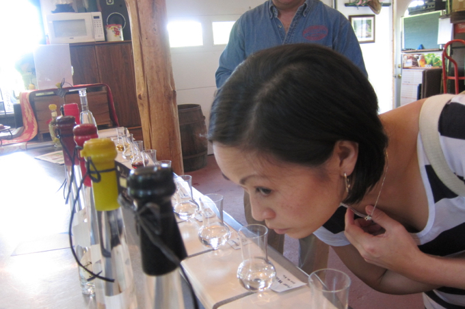 Hoang, a much more refined human than I, appreciates the nuances of the different eaux-de-vie aromas.